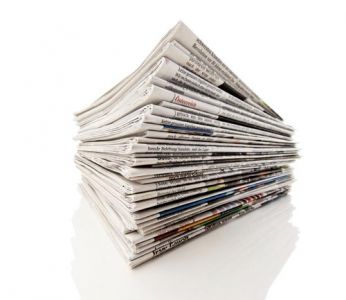 Stack of newspapers high resolution image